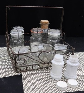 lot 93 image: VINTAGE WROUGHT IRON BASKET WITH OLD BOTTLES