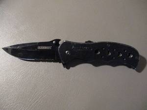lot 45 image: Black Guidesman Folding Knife