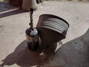 lot 11 image: propane torch and oil funnel