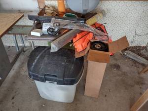 lot 43 image: Garbage Can and Items on Table