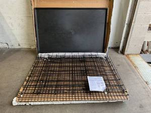 lot 103 image: Midwest Homes for Pets Ginormus Double Door Dog Crate XXL - Black