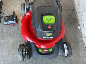 lot 30 image: Toro 60V Max 21 in. Recycler Self-Propel wSmartStow Lawn Mower with Charger. BATTERY NOT INCLUDED