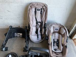 lot 59 image: Evenflo Pivot Modular Travel System with LiteMax Infant Car Seat with Anti-Rebound Bar (Desert Tan)