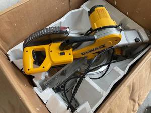 lot 78 image: DEWALT 15 Amp Corded 12 in. Double Bevel Sliding Compound Miter Saw with XPS technology, Blade Wrench and Material Clamp