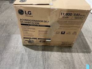 lot 447 image: LG 11,800 BTU 115V Through-the-Wall Air Conditioner  READ