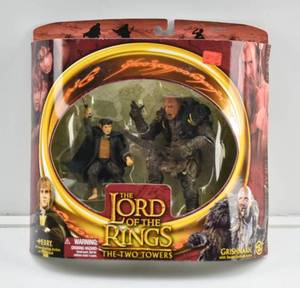 lot 52 image: LOTR Two Towers Merry & Grishnakh with Sword Swinging Actions Figures in Box