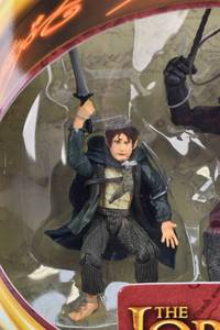lot 49 image: LOTR Two Towers Pippin & Ugluk with Sword and Whip Actions Figures in Box