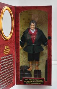 lot 58 image: LOTR Two Towers Collector Series Bilbo with Authentically Styled Fabric Outfit & Accessories Figure in Box