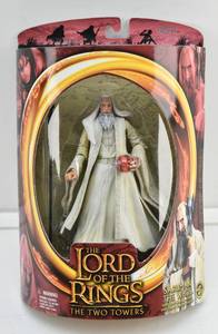lot 34 image: LOTR Two Towers Saruman the White with Staff Rising Action & Eye of Sauron Palantir Figure in Box
