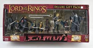 lot 31 image: LOTR Fellowship of the Ring Deluxe Gift Pack with Nine Characters, Ring, and Map Figures in Box