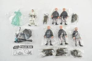 lot 6 image: 8 Unopened Vintage Star Wars Kenner Figures - Stormtrooper Han Solo, Bomarr Monk, Spirt of Obi-Wan, Cantina Band