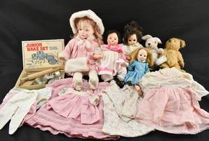 lot 86 image: Box of Vintage Dolls with Clothes, Stuffed Animals, Baking Toys
