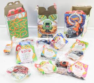 lot 120 image: Group of 11 Hot Wheels McDonalds Happy Meal Toys