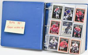 lot 78 image: Binder of Fleer Ultra 92-93 and Topps 95 NHL Hockey Trading Cards