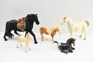 lot 107 image: Assortment of 5 Black and White Toy Horses, Breyer, Etc.