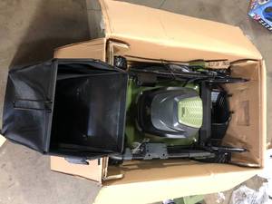 Green Machine 62V Brushless 22 in. Electric Cordless Battery Self- Propelled Lawn Mower with 2 4.0 Ah Batteries and Charger  Customer Returns See Pictures