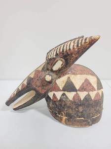 lot 62 image: Carved African wooden mask of animal