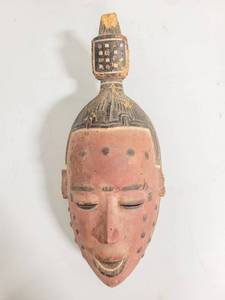 lot 61 image: African mask carved from wood