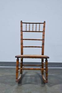 lot 15 image: Small Bamboo Style Wooden Rocking Chair w Caned Seat