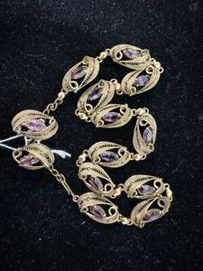 lot 36 image: Gold Plated Alice Caviness Earrings and Necklace