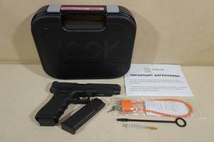 lot 4 image: Unfired Glock 34 Gen 3 9mm Semi-Auto Pistol - 2 Magazines