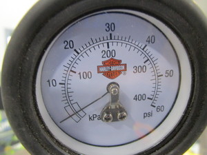 lot 213 image: Harley Davidson Tire Pressure Gauge