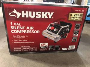 lot 16 image: Husky 1 Gal. Portable Electric-Powered Silent Air Compressor Customer Returns See Pictures