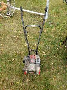 lot 216 image: Earthquake 40cc Mini Tiller