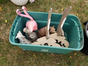lot 247 image: Yard Art in Tote and Pail - Pink Flamingos