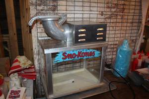 lot 949 image: 2008 Gold Medal Sno-Konette Commercial Ice ShaverSnow Cone Machine 1003 with Flavorings and Accessories