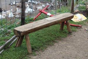 lot 1023 image: Handmade Wood Log Bench