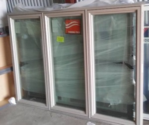 lot 85 image: Thermo-Tech Mulled triple Casement. 89 in. L x 60 in. T.