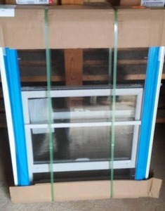 lot 243 image: Thermo-Tech Double Hung Window,