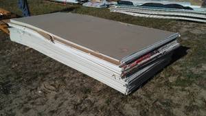 lot 137 image: Sheet Rock. 12 Feet Long.