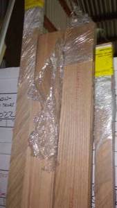 lot 511 image: Unstained Oak Trim And Baseboards.