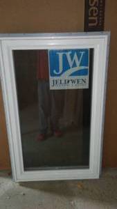 lot 423 image: JW Jeld Wen Vinyl Window.  29.5 W x 48 in. T casement.