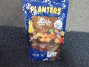 6- 6 oz pks Planters Nuts & Chocol...