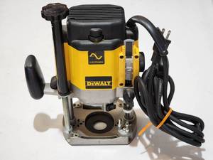 lot 28 image: DeWalt Double Insulated Electric Plunge Cut Router