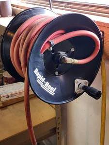 lot 56 image: Wall Mounted Air Hose and Reel