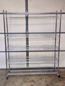 lot 31 image: Rolling Bakers Rack