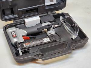 lot 107 image: Porter Cable Finishing Nailer Air Tool Model PIN138