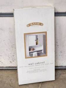 lot 192 image: Wall Cabinet with Doors, Shelf and Towel Bar