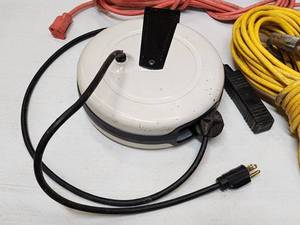 lot 256 image: (3) Garage Extension Cords & (1) Retractable Extension cord Unit