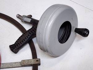 lot 257 image: (2) Plumbing Snake Tools & (1) Wire Feed Tool