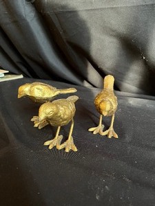 lot 68 image: Set of Three Gold Colored Metal Birds