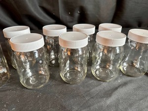 lot 85 image: 8 Covered Glass Jars (12oz), 1 Kerr Quart Glass Jar