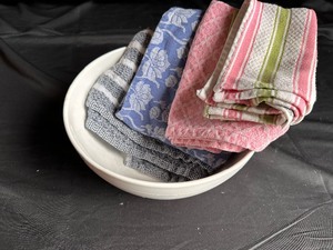 lot 215 image: Pottery Barn White Mixing Bowl and Variety of Kitchen Towels