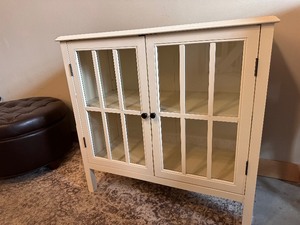 lot 243 image: Cream Colored Side Board with Glass Doors