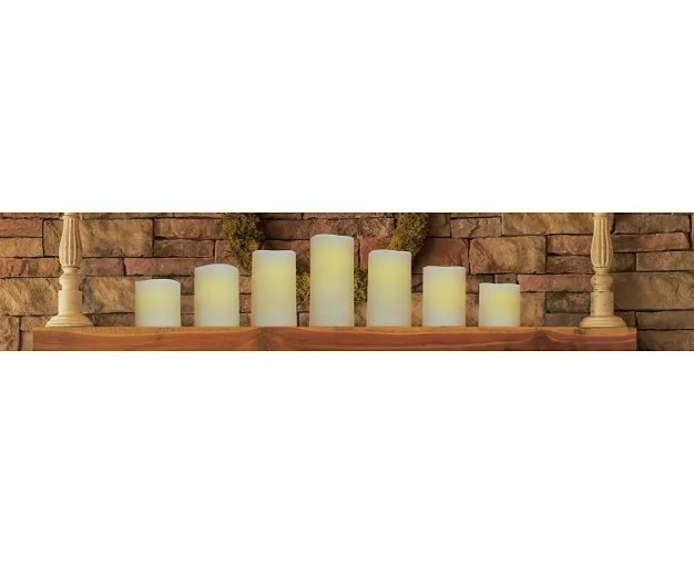 lot 419 image: NEW Members Mark 7-Piece Flameless Candle Pillar Set with Remote and Timer