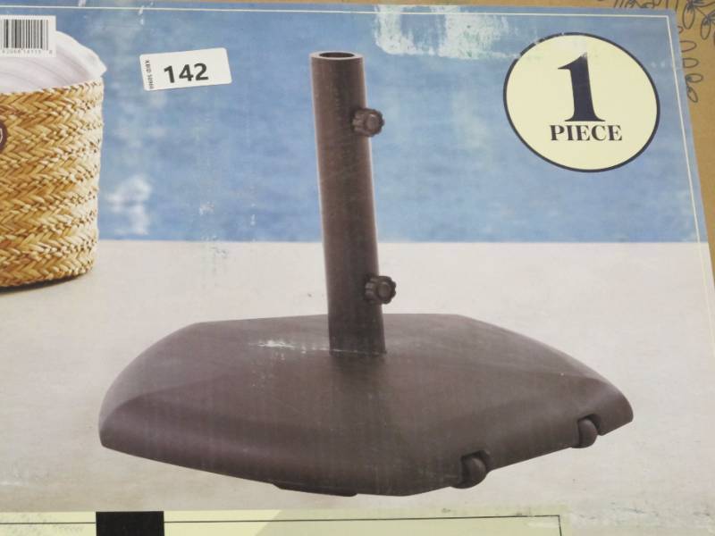 lot 142 image: NEW Members Mark Concrete Umbrella Base with Wheels